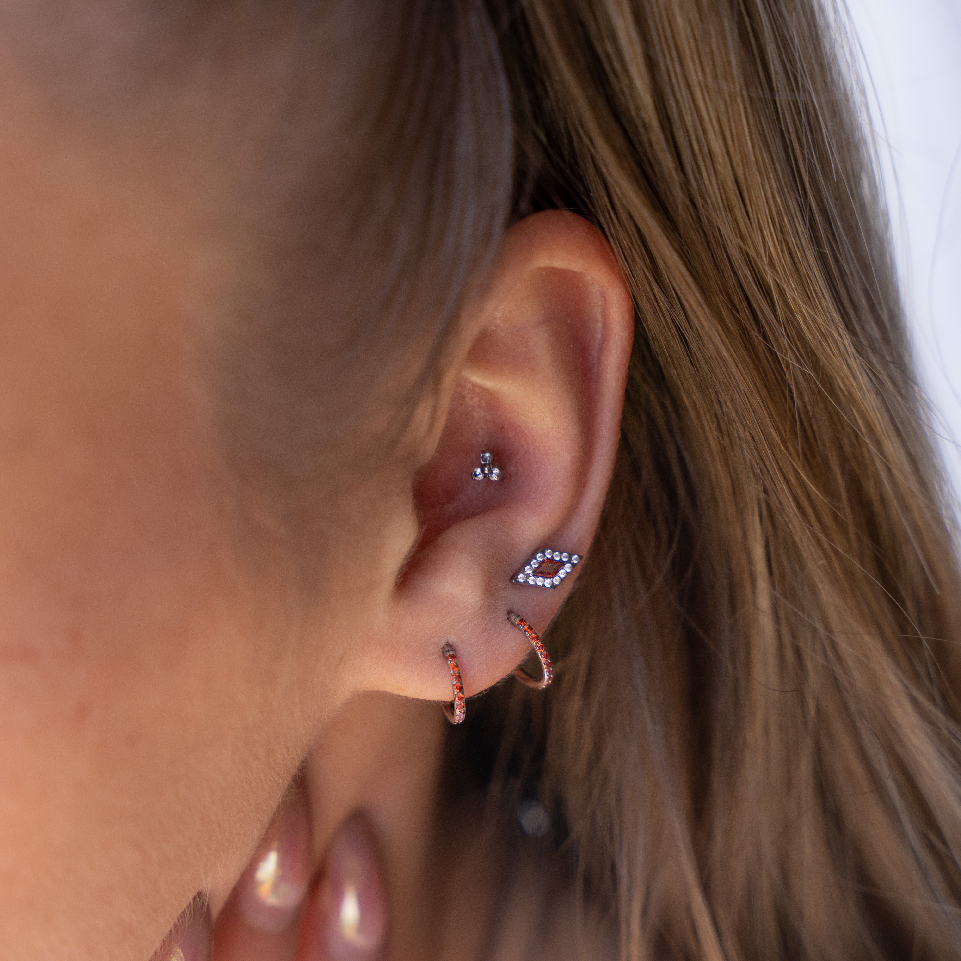 Piercing Hadès Rouge lobe